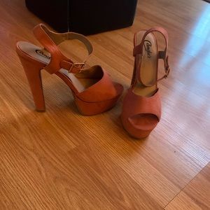 Candies sandle, in the orange color family.